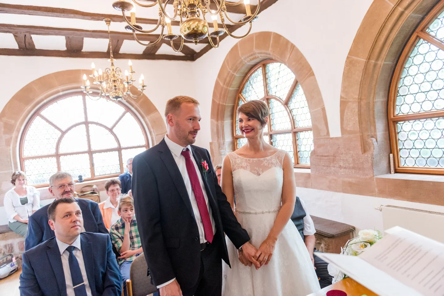 Bridal couple at the wedding ceremony in a church