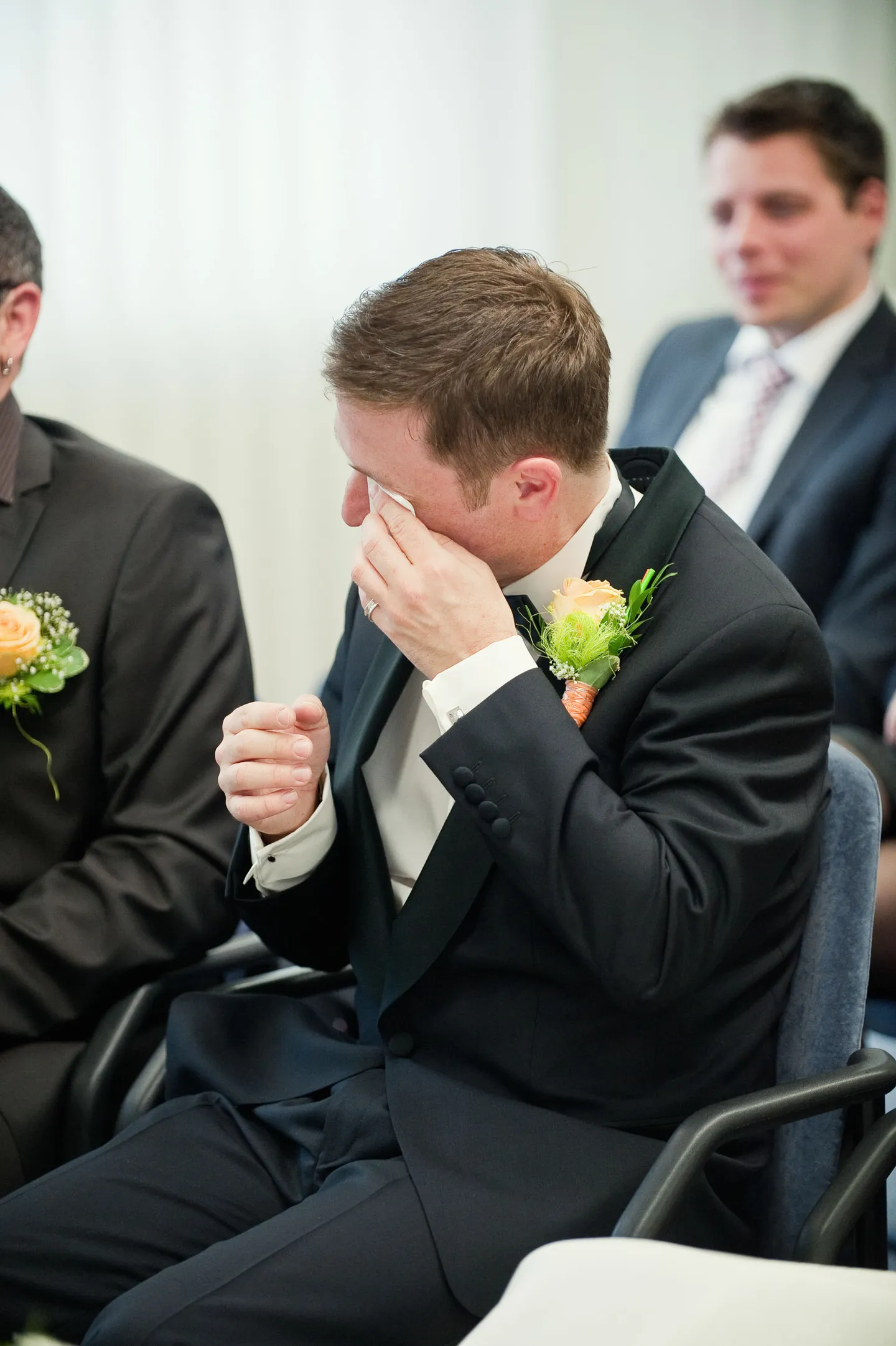 Groom cries at the wedding