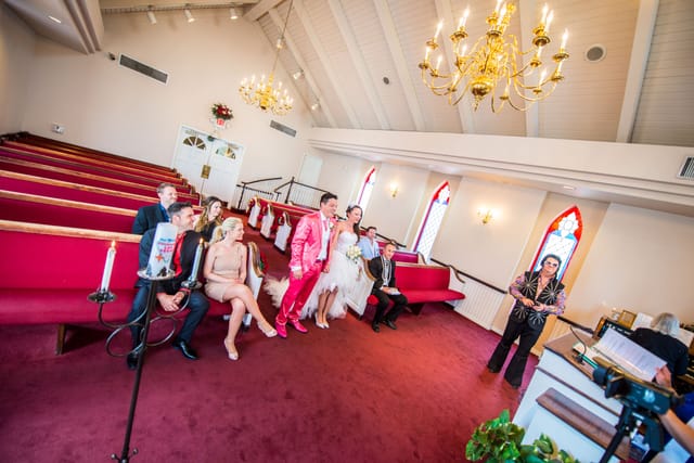 Wedding ceremony in a small chapel with guests