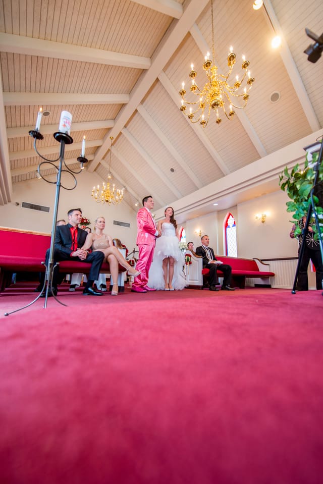 Wedding ceremony in a church with a red carpet