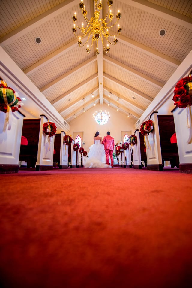 Bridal couple in a church during the wedding procession