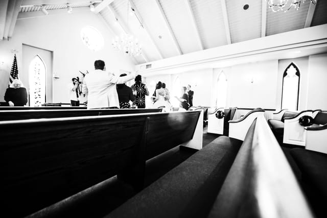 Empty pews in a bright chapel