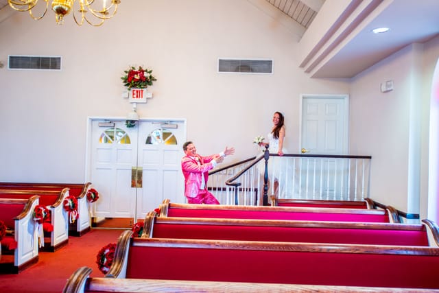 Happy couple in the chapel at the wedding