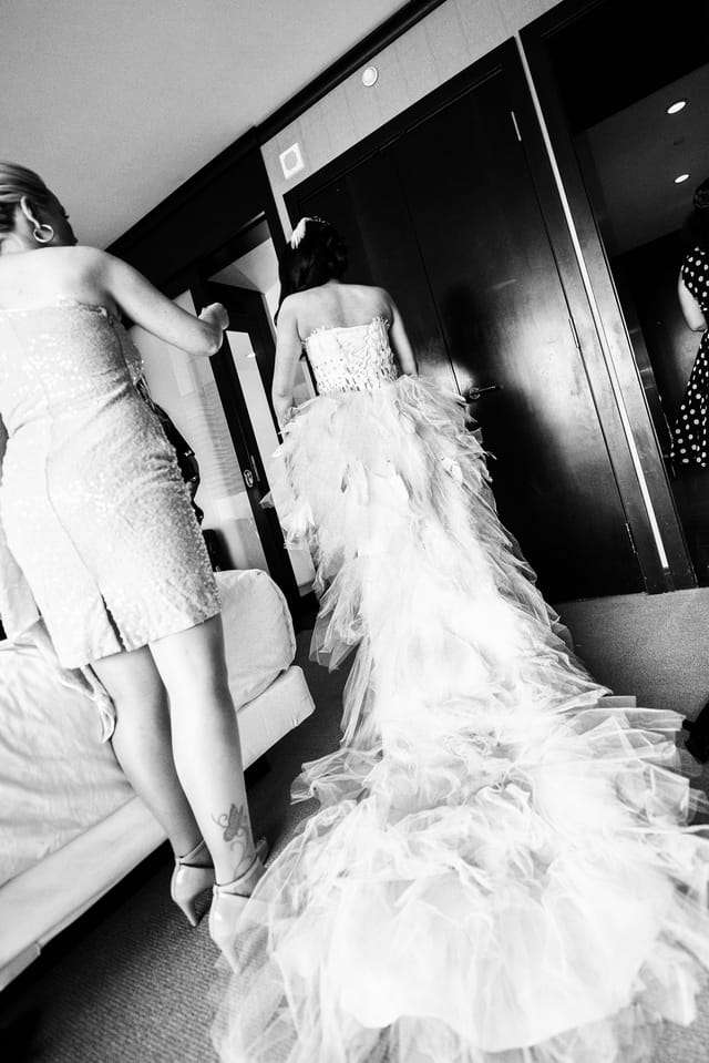Bride with long dress in the room