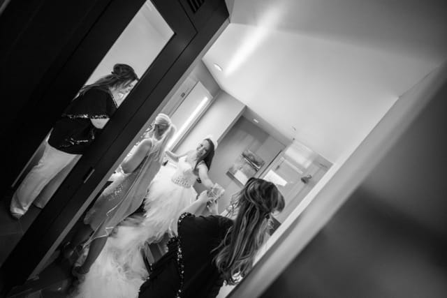 Women prepare together, wedding anniversary