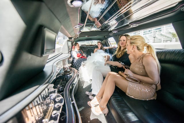 Women in limousine celebrate special occasions