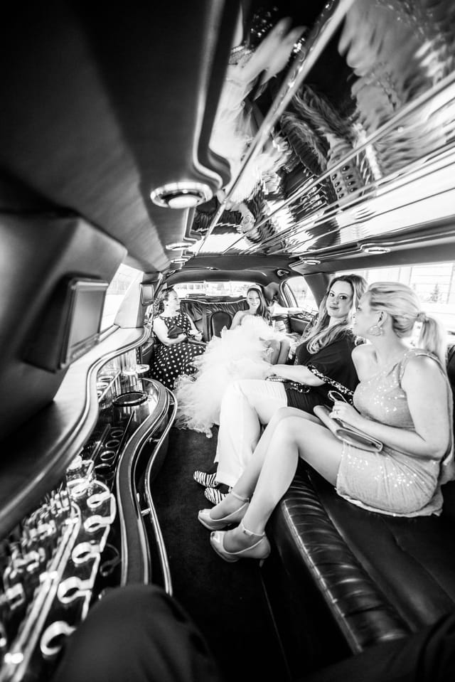 Celebrating people in a limousine